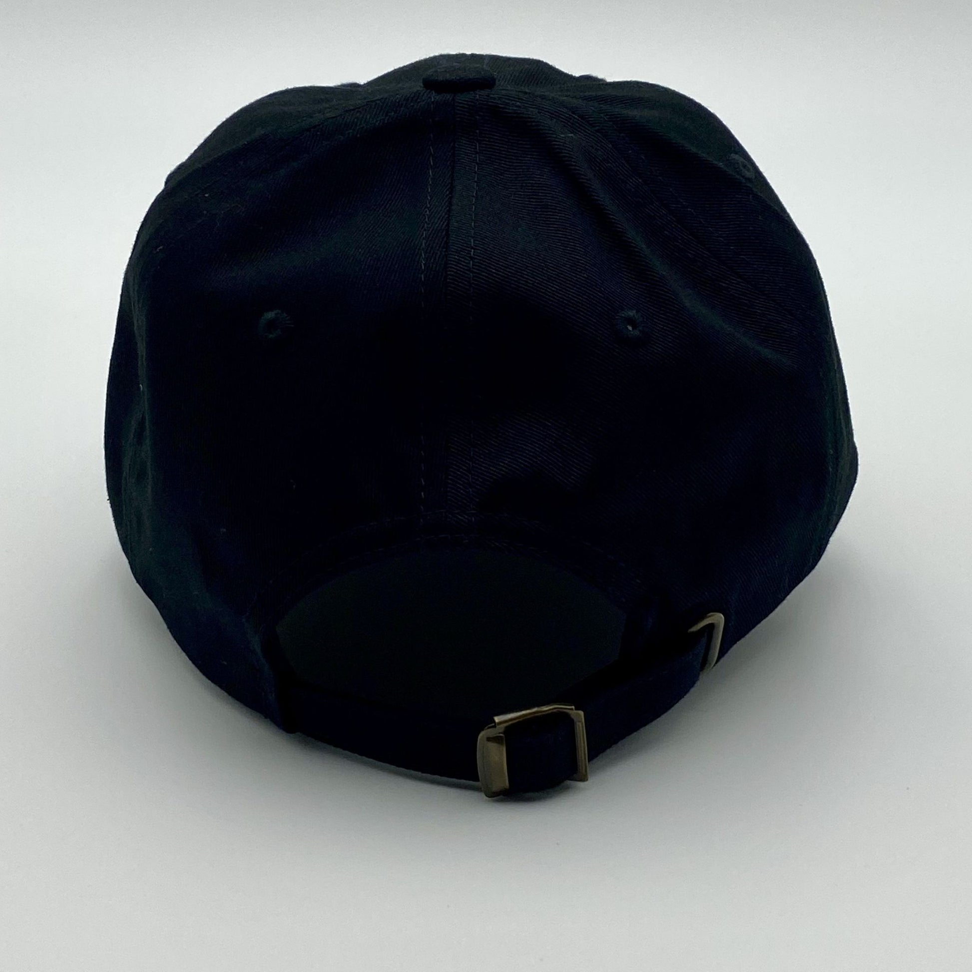 Black cap with a buckle on a white background