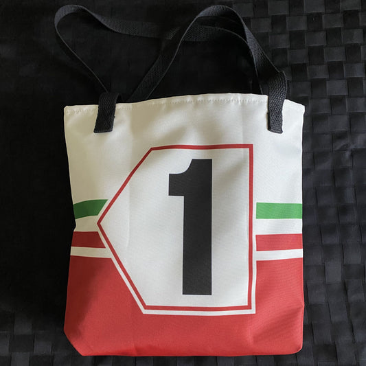 Tote bag with number 1 design and Italian flag on a textured black surface