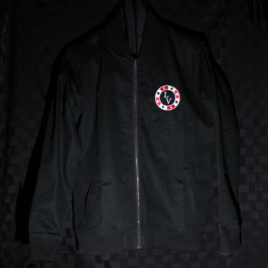 Black bomber jacket with an embroidered logo on a black chequered background