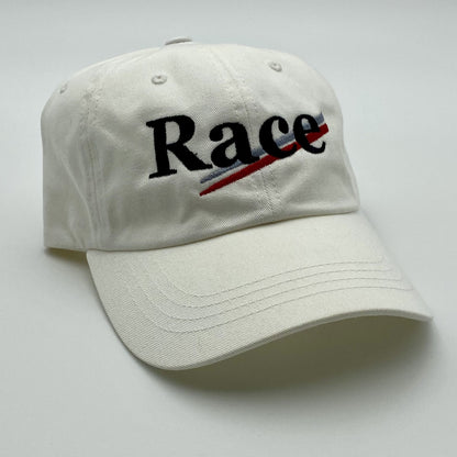 White cap with 'Race' embroidered on a white background