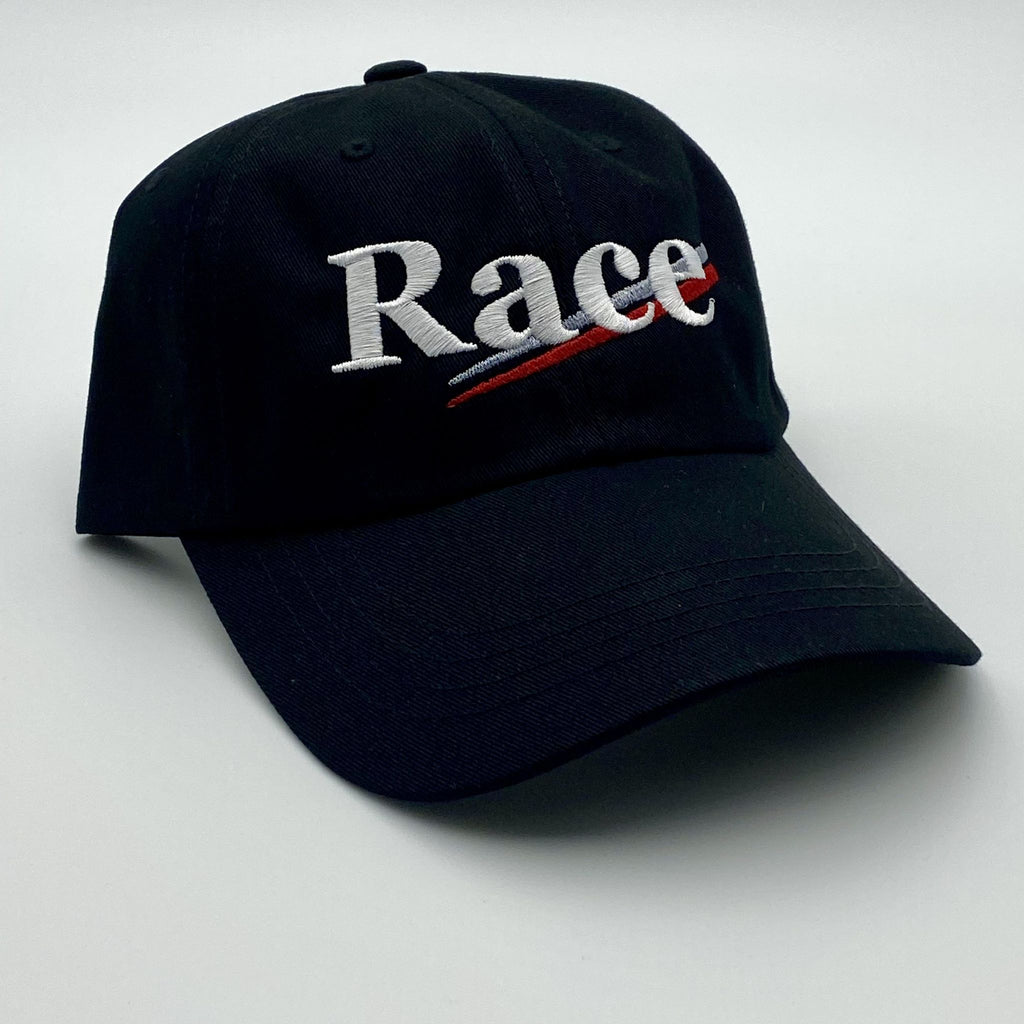 Black cap with 'Race' embroidered on a white background