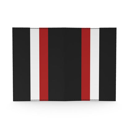 Black passport cover with red, and white stripes on a white background